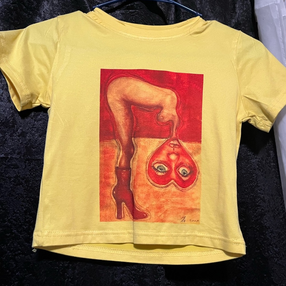 Abstract baby tee! Too tight on my chest def fits a small chest better